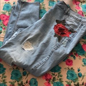 Blue designed ripped jeans